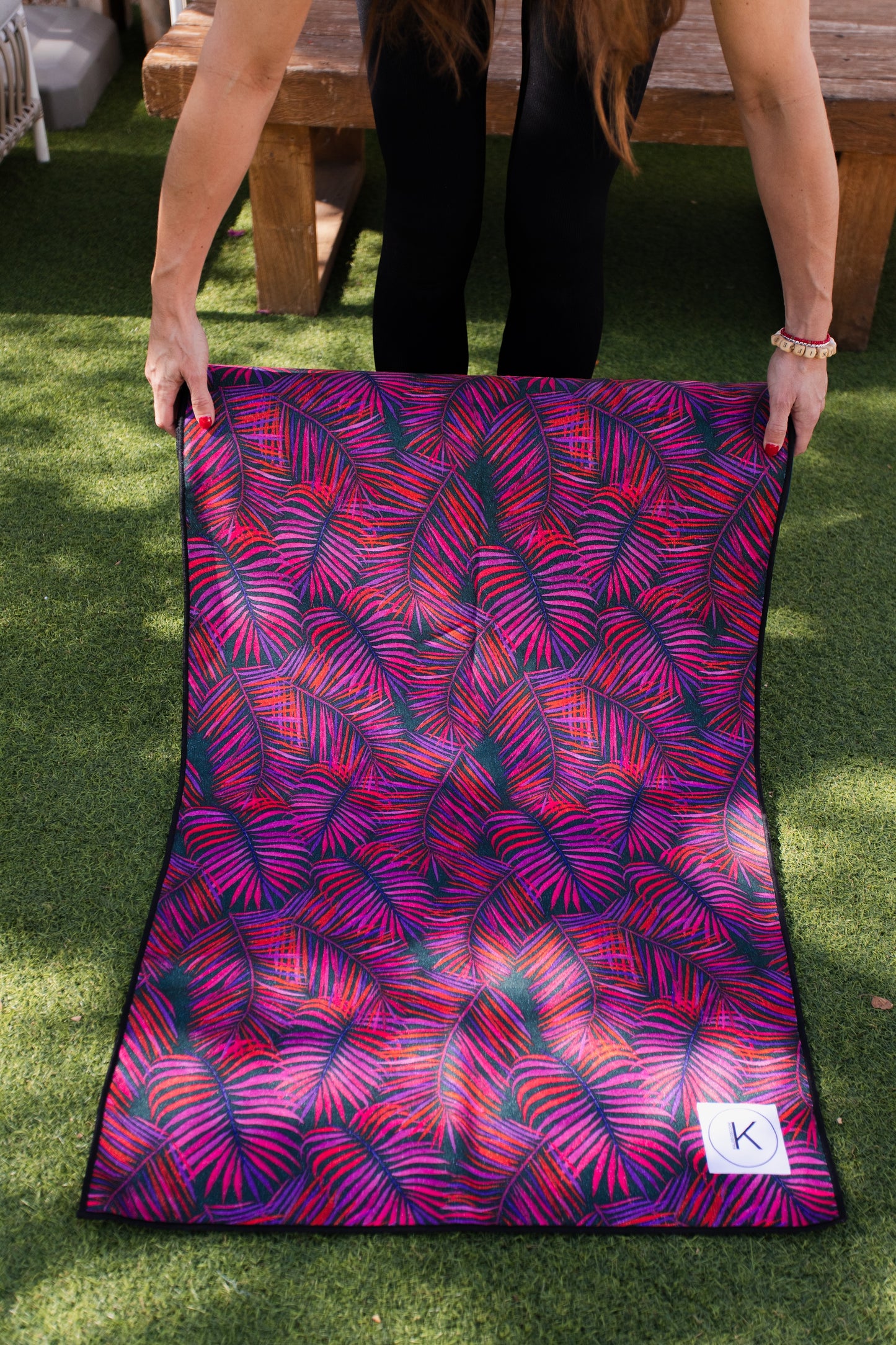 Kaleidoscope yoga towels in vibrant prints for men and women, perfect for hot yoga sessions