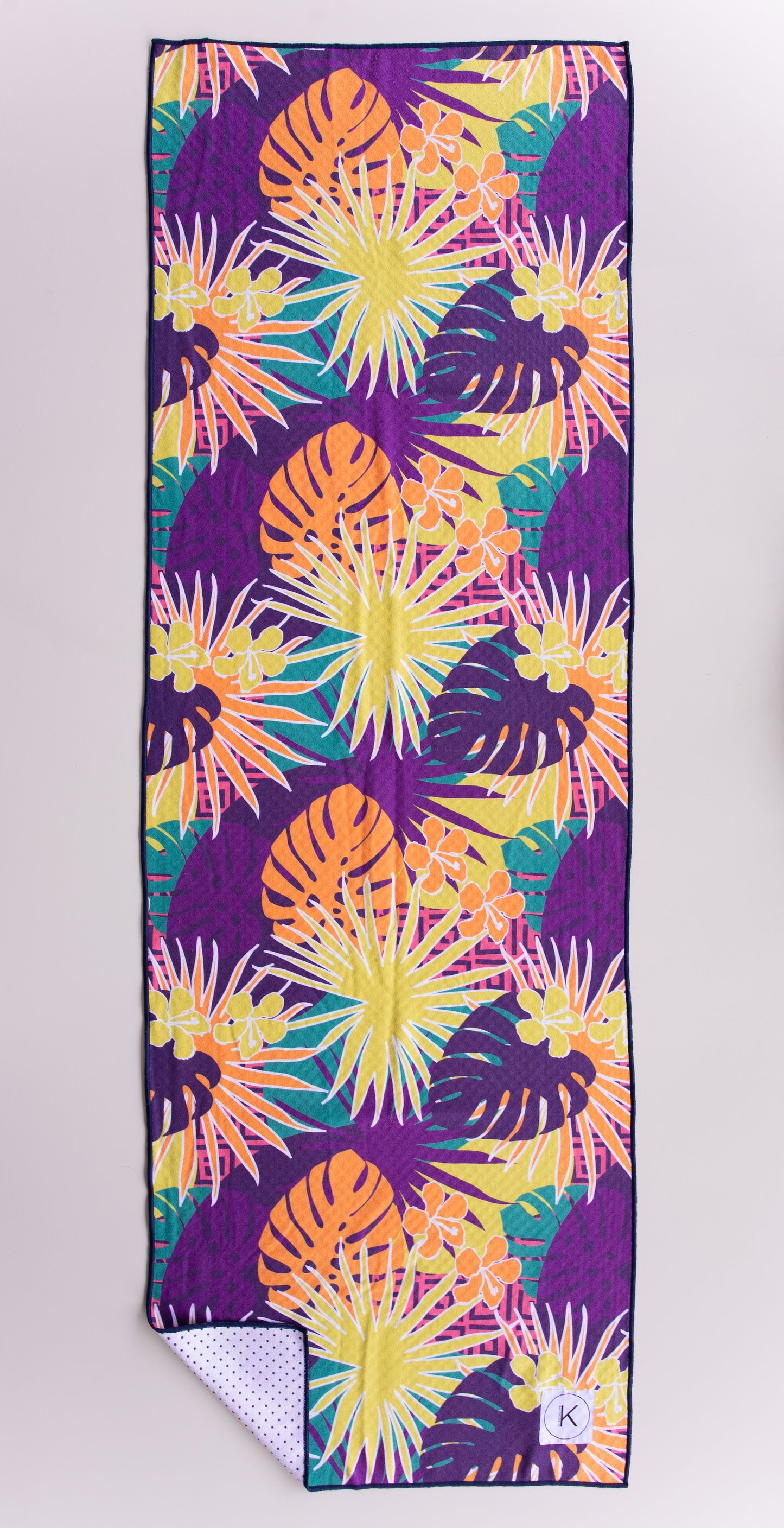 Kaleidoscope yoga towels in vibrant prints for men and women, perfect for hot yoga sessions