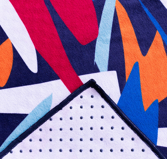 Kaleidoscope yoga towels in vibrant prints for men and women, perfect for hot yoga sessions