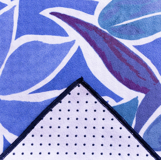 Kaleidoscope yoga towels in vibrant prints for men and women, perfect for hot yoga sessions