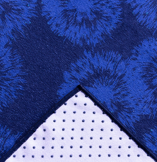 Kaleidoscope yoga towels in vibrant prints for men and women, perfect for hot yoga sessions