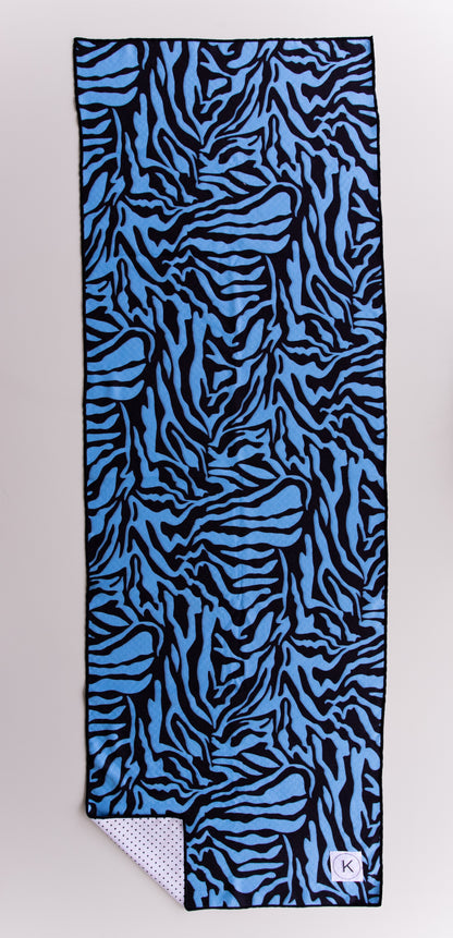 Colorful kaleidoscope yoga towels for hot yoga, featuring unique prints for both women and men