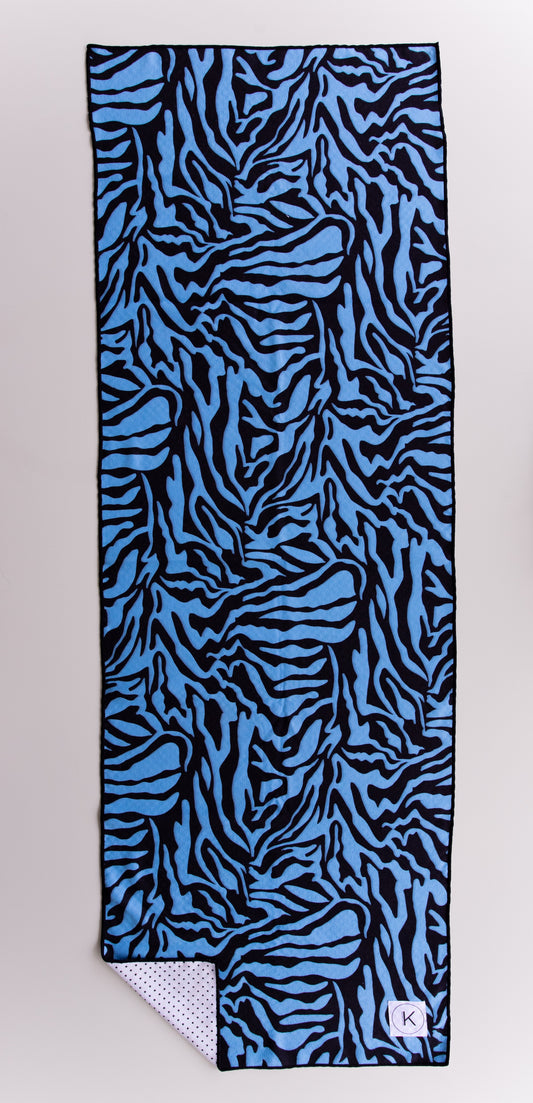Colorful kaleidoscope yoga towels for hot yoga, featuring unique prints for both women and men