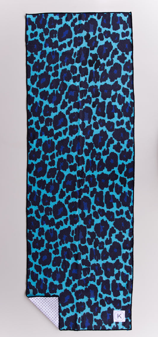 Kaleidoscope yoga towels in vibrant prints for men and women, perfect for hot yoga sessions