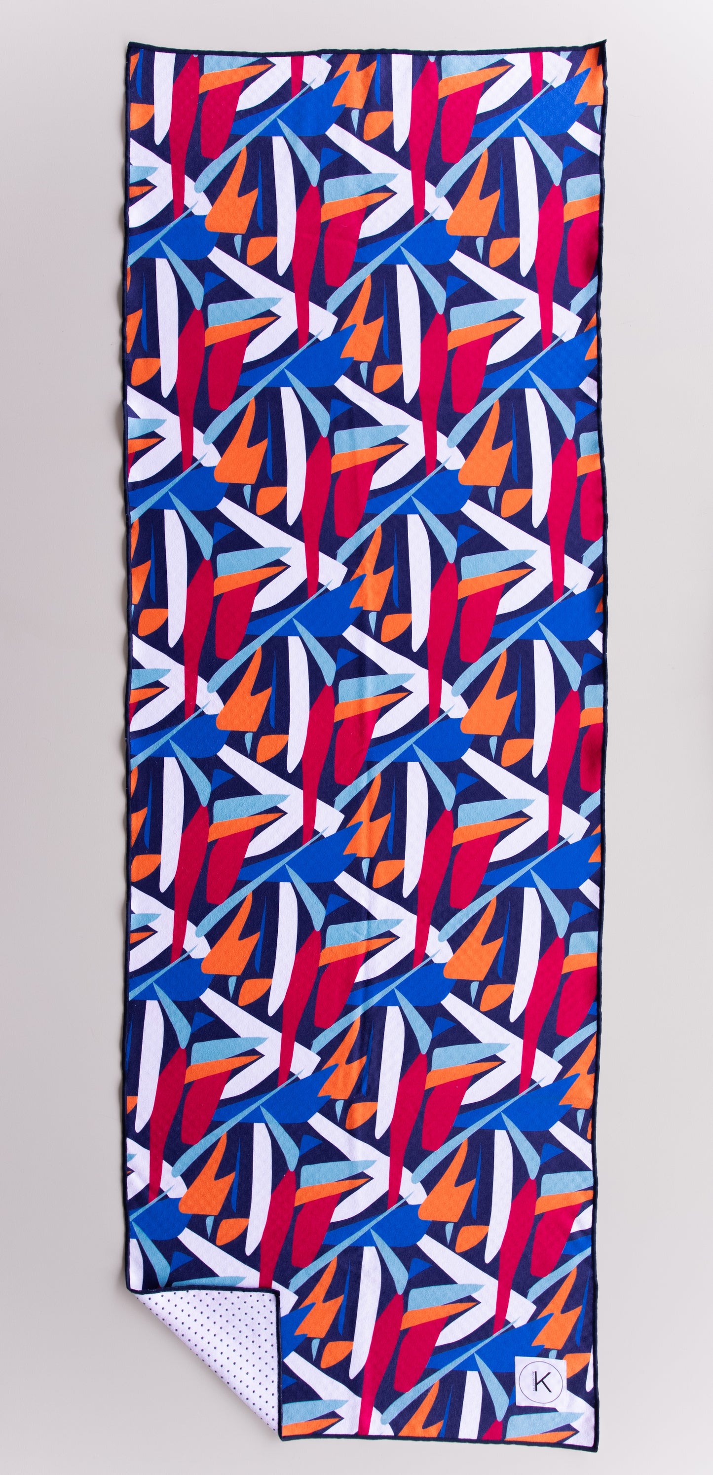 Kaleidoscope yoga towels in vibrant prints for men and women, perfect for hot yoga sessions